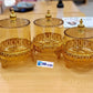 3-Piece Victorian-Style Amber Canister Set with Gold Filigree Base