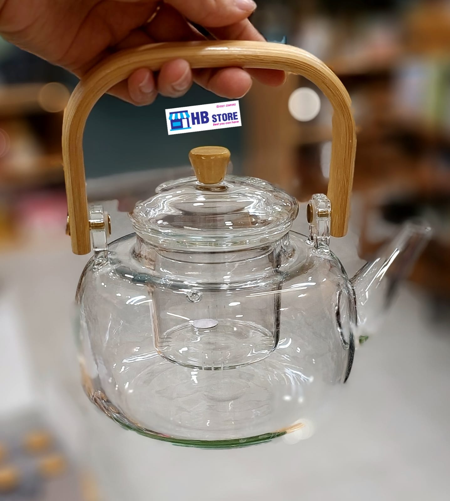 Elegant Glass Teapot with Natural Wood Handle and Infuser
