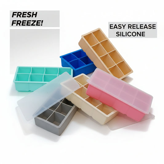 Large cube silicone ice cube trays with clear lids.