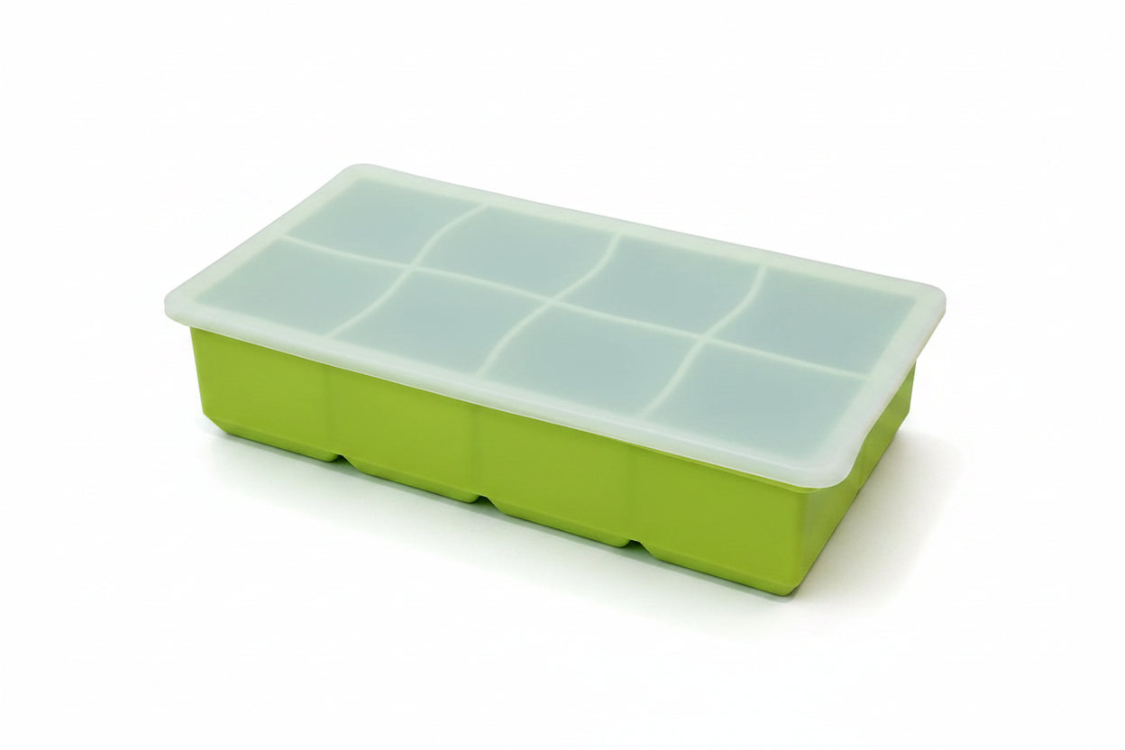 Large cube silicone ice cube trays with clear lids.