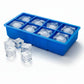 Large cube silicone ice cube trays with clear lids.