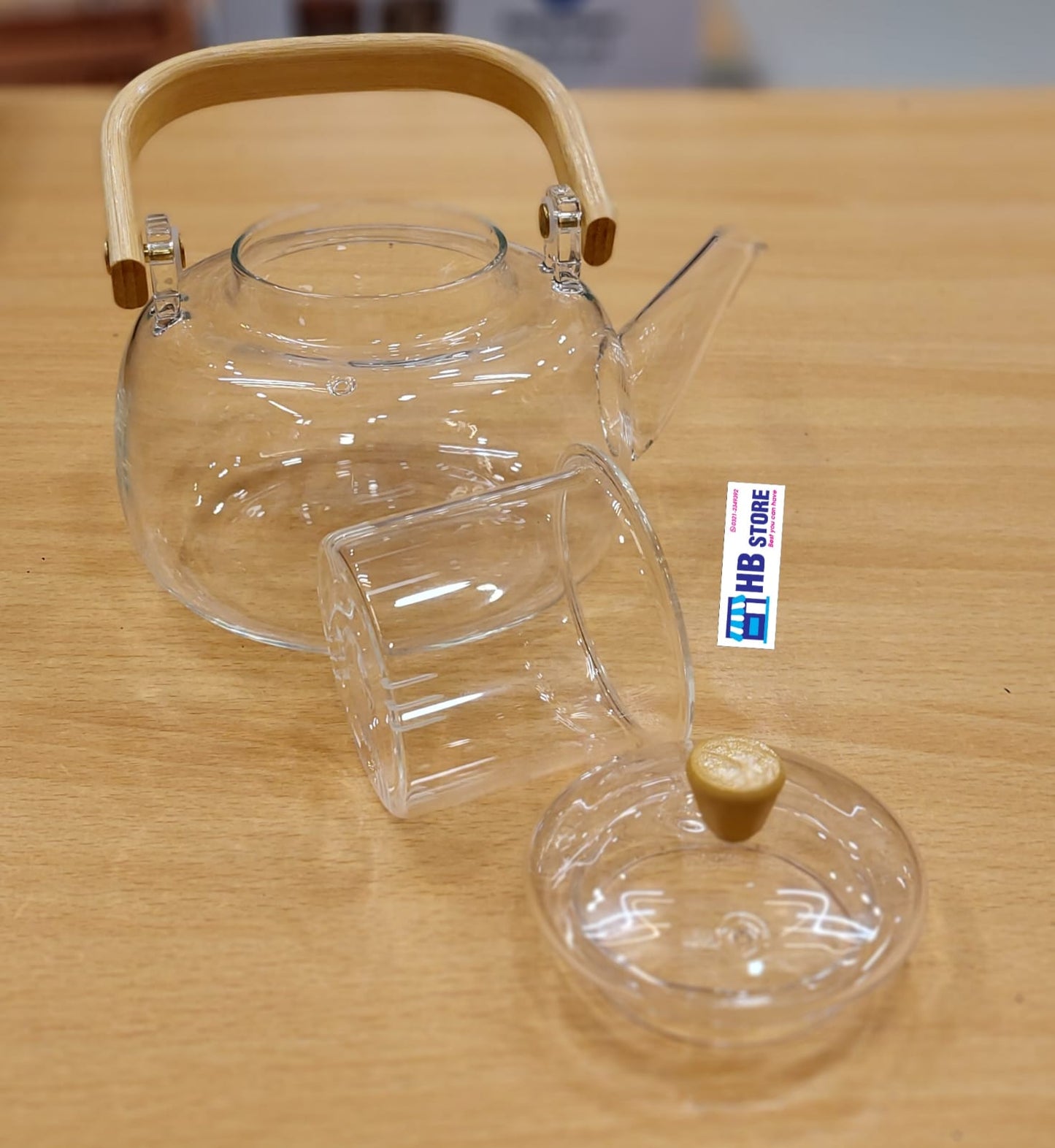 Elegant Glass Teapot with Natural Wood Handle and Infuser